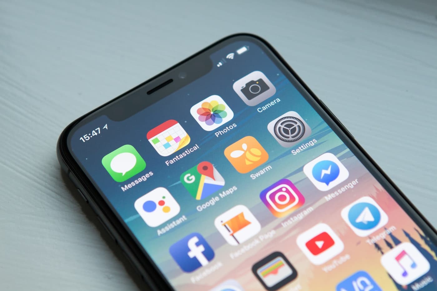 A phone in hand — the kind of app we ship
