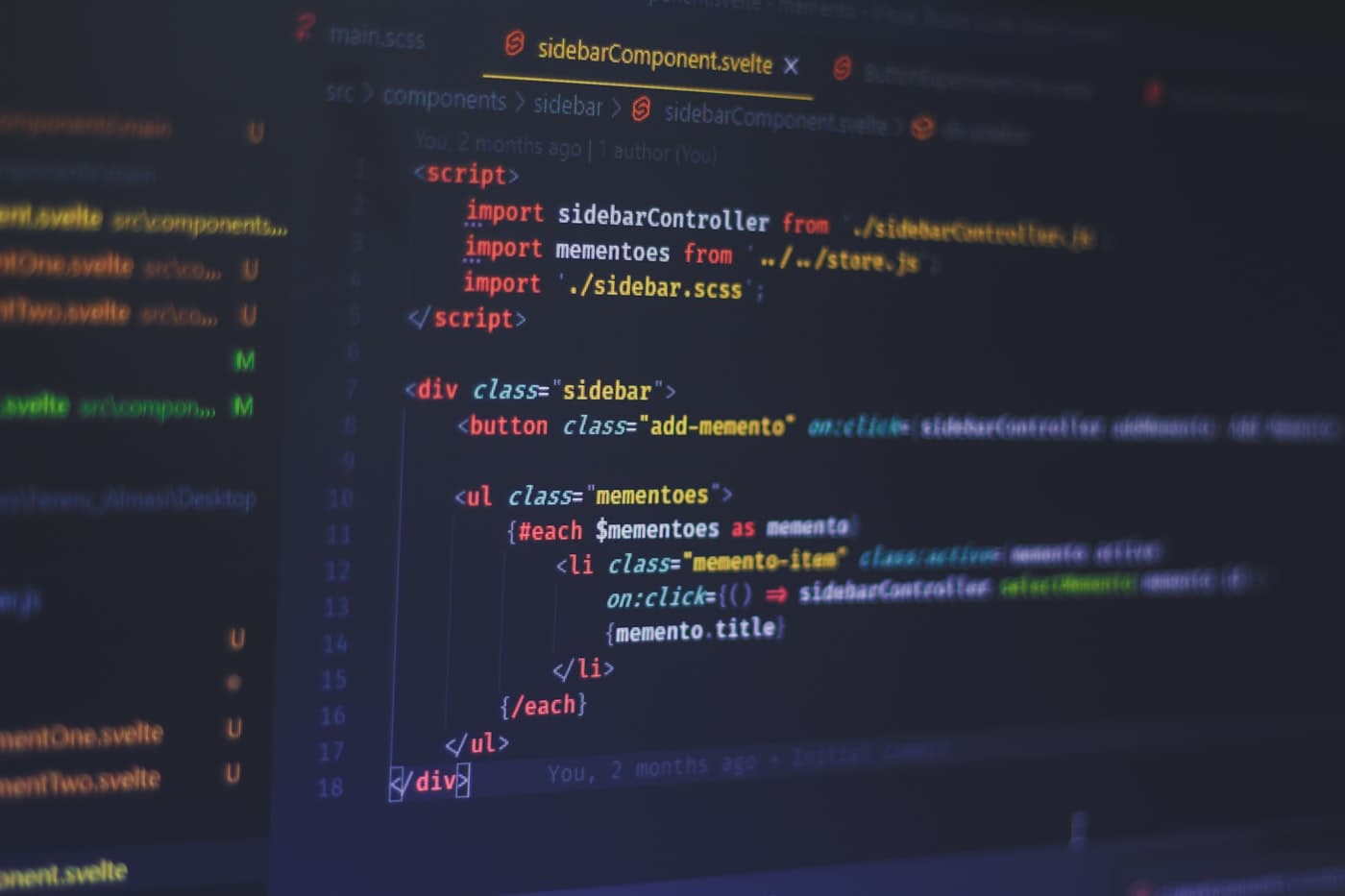 Code on a laptop during a web build